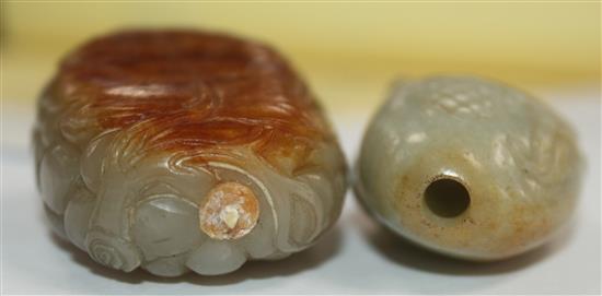 Two Chinese celadon and russet jade snuff bottles, 1800-1900, 5cm, both with coral stoppers